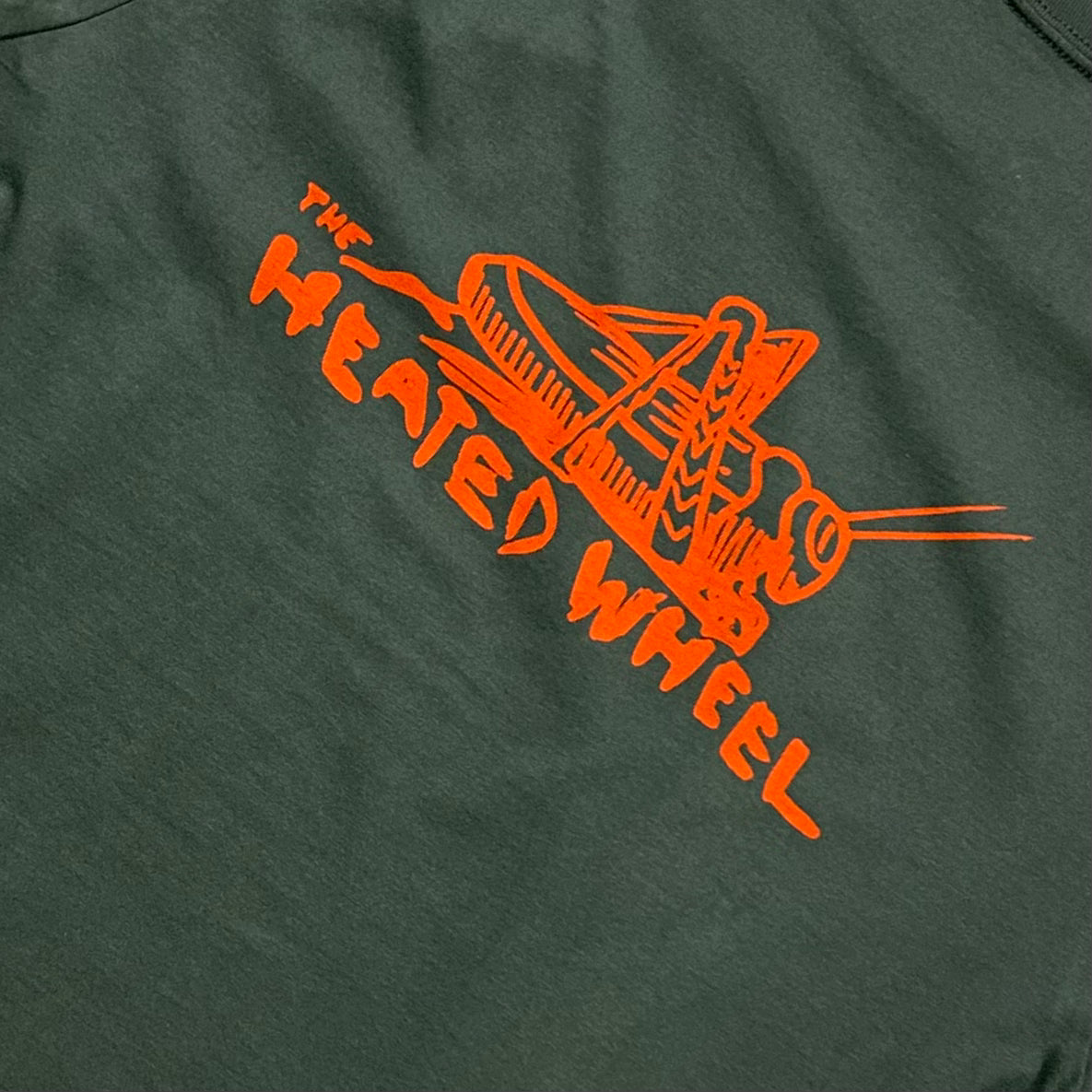 The Heated Wheel - Grasshopper Tee