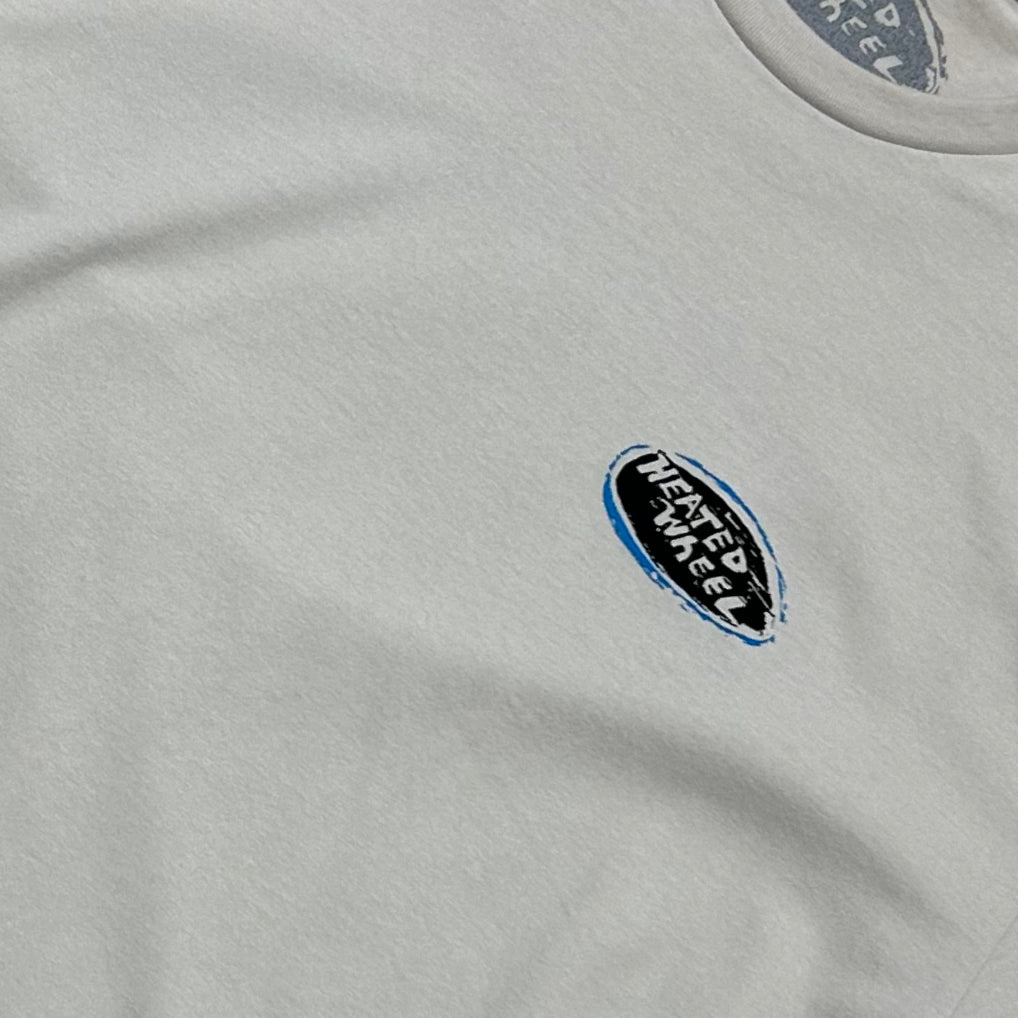 The Heated Wheel - Oval Tee