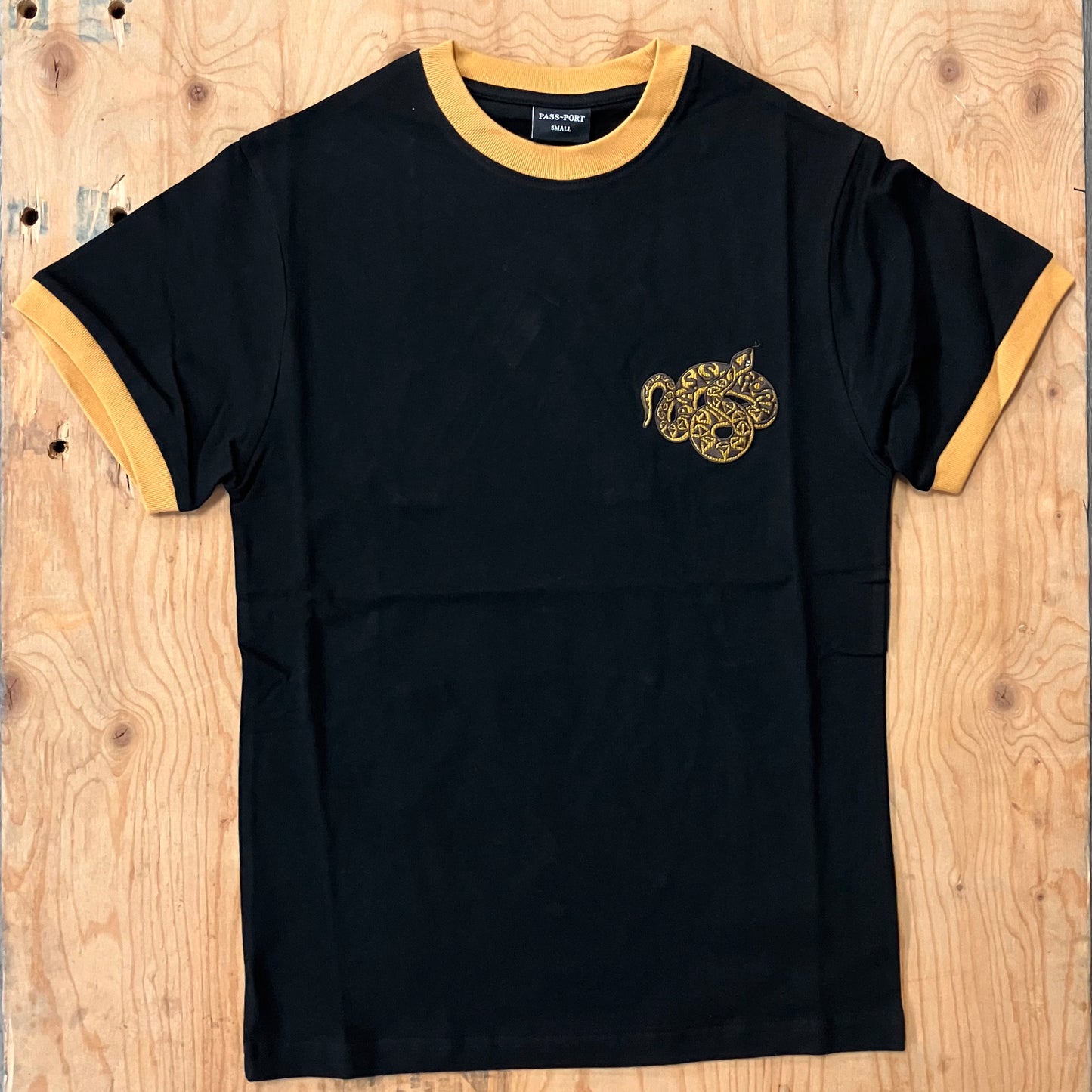 Pass~Port - Coiled Tee